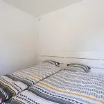 Lecomte - The Shoreline Green C Apartment